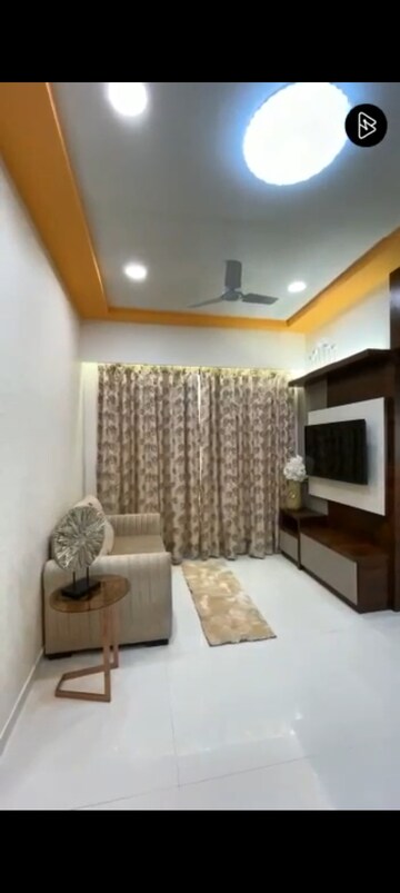 Living Room in 2 BHK Apartment at Kaneri Heights, Naigaon East – for Sale