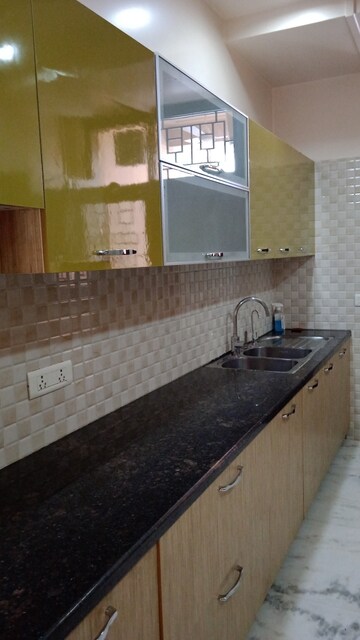 Kitchen in 3.5 BHK Apartment at Adani M2K Oyster Grande, Sector 102 – for Sale