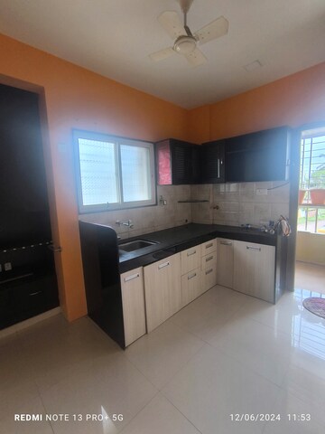 Kitchen in 2 BHK Apartment at Shivaji Nagar – for Sale