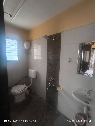 Bathroom in 2 BHK Apartment at Shivaji Nagar – for Sale
