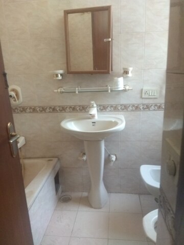 Bathroom in 4 BHK Builder Floor at Maharani Bagh – for Sale