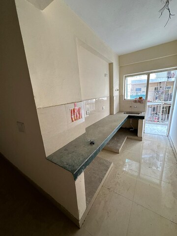 Kitchen in 3 BHK Apartment at Adore Happy Homes Grand, Sector 85 – for Sale