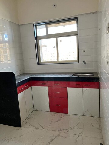 Kitchen in 1 BHK Apartment at Shellproof Gladiolus Tower, Vasai East – for Sale