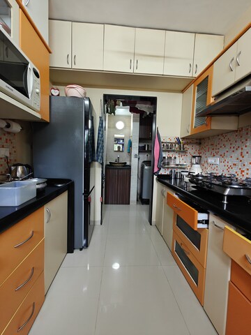 Kitchen in 2 BHK Apartment at Vijay Annex 5, Waghbil – for Sale