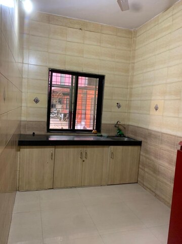 Kitchen in 2 BHK Apartment at Dudhwala Complex Phase 2, Agripada – for Sale