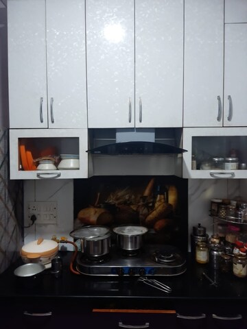 Kitchen in 2.5 BHK Apartment at Mahagun Moderne, Sector 78 – for Sale