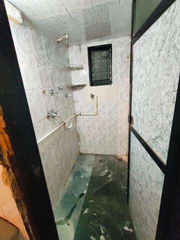 Bathroom in 1.5 BHK Apartment at Subhash Nagar – for Sale