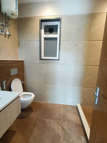 Bathroom in 3.5 BHK Builder Floor at Sainik Colony – for Sale