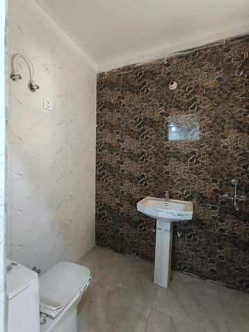 Bathroom in 4 BHK Builder Floor at Green Fields Colony – for Sale
