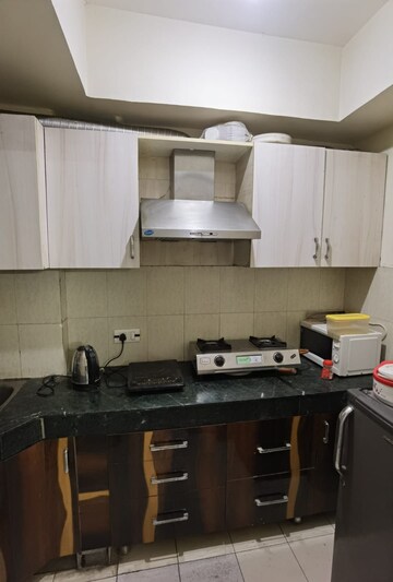 Kitchen in 2.5 BHK Apartment at Paras Tierea, Sector 137 – for Sale