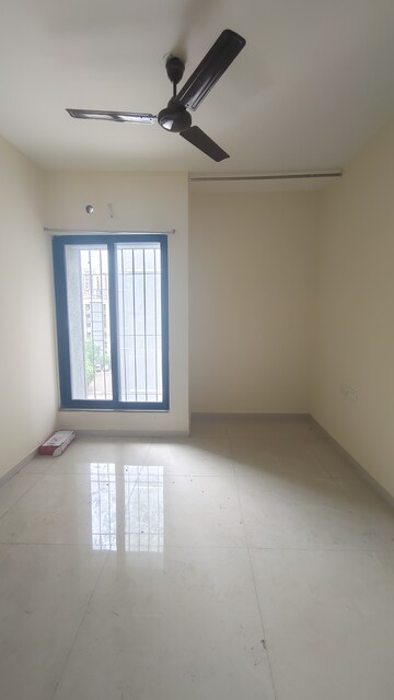 Room in 2 BHK Apartment at Dosti Desire, Brahmand – for Sale