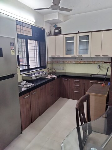 Kitchen in 2 BHK Apartment at Vasant Sagar, Kandivali East – for Sale