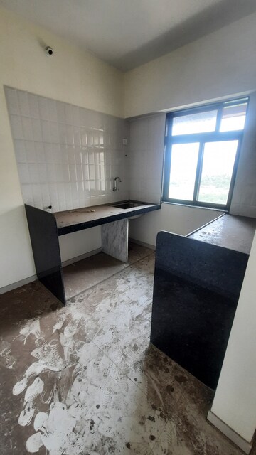 Kitchen in 1 BHK Apartment at KM Horizon Flora, Ghodbunder Road – for Sale