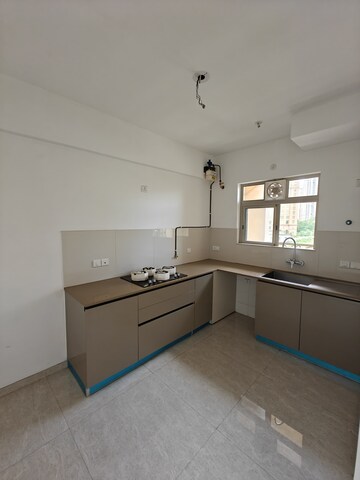 Kitchen in 2 BHK Apartment at Hiranandani Delanna, Ghodbunder Road – for Sale