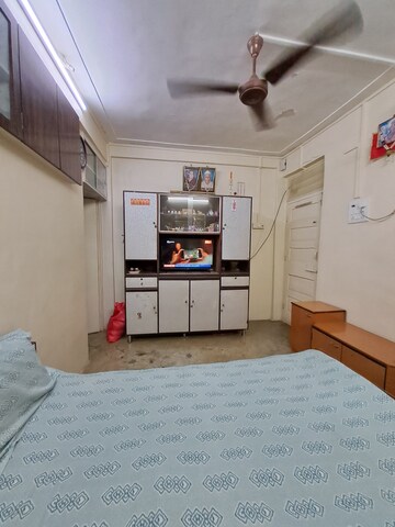 Living Room in 1 BHK Apartment at Dharti Pressidio, Kandivali West – for Sale