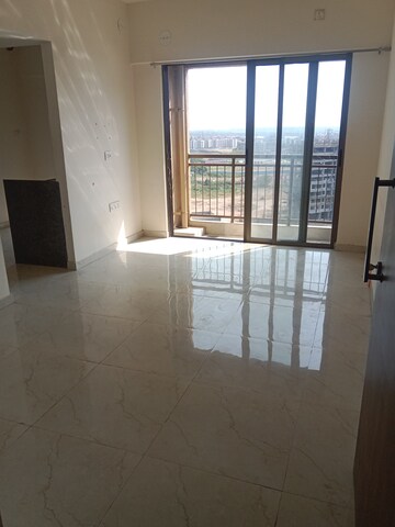 Living Room in 1 BHK Apartment at Sunteck West World, Naigaon East – for Sale