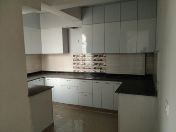 Kitchen in 2.5 BHK Builder Floor at Grihapravesh, Sector 77 – for Sale