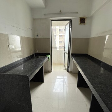 Kitchen in 1 BHK Apartment at Lodha Palava City Lakeshore Greens, Hedutane – for Sale