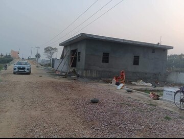 Plot Area in  Plot at Bhopani Village – for Sale