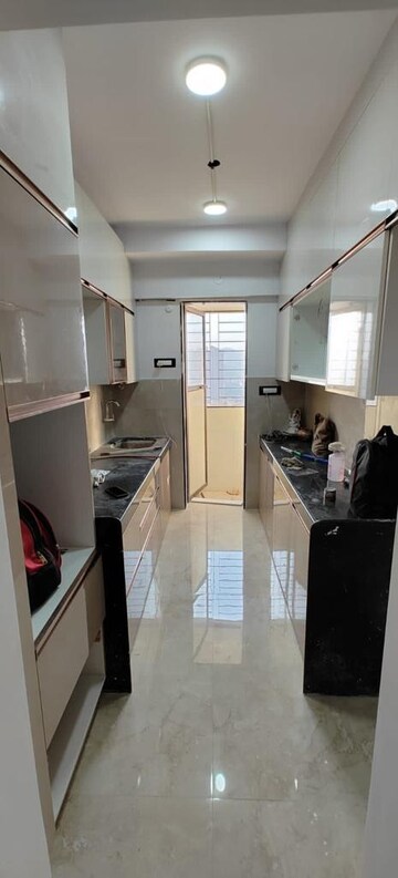 Kitchen in 2 BHK Apartment at Lodha Luxuria, Majiwada – for Sale