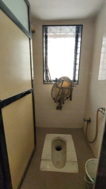 Bathroom in 1 BHK Apartment at Kalyan West – for Sale