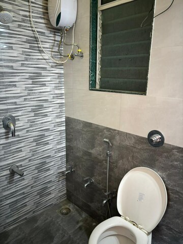Bathroom in 1 BHK Apartment at Mahavir Kalpavruksha, Ghodbunder Road – for Sale