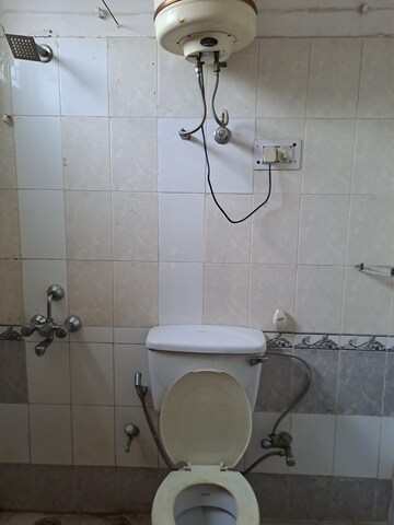 Bathroom in 3.5 BHK Builder Floor at Orchid Island, Sector 51 – for Sale