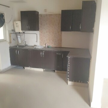 Kitchen in 3.5 BHK Apartment at Aims Golf City, Sector 75 – for Sale