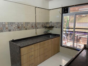 Kitchen in 2 BHK Apartment at Man SN Saket CHS, Goregaon West – for Sale