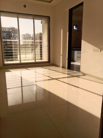 Living Room in 1 BHK Apartment at Shree Ram Realty Heights, Naigaon East – for Sale