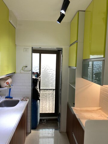 Kitchen in 2 BHK Apartment at Man Opus, Mira Road – for Sale