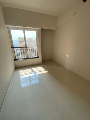 Room in 2 BHK Apartment at Rustomjee Azziano Wing D, Majiwada – for Sale
