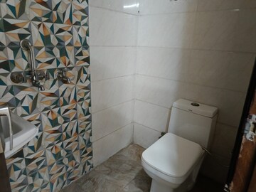 Bathroom in 3 BHK Builder Floor at Vasundhara Sector 1 – for Sale