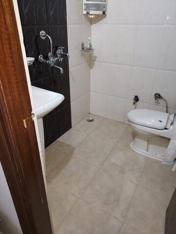 Bathroom in 3 BHK Builder Floor at Vasundhara Sector 1 – for Sale