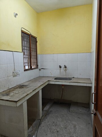 Kitchen in 2 BHK Apartment at RWA Apartments Sector 21, Sector 21 – for Sale