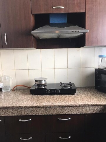 Kitchen in 2 BHK Apartment at Shree Vardhman Green Court, Sector 90 – for Sale