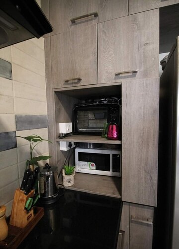 Kitchen in 2.5 BHK Apartment at Bhartiya Nikoo Homes Phase 2, Thanisandra Main Road – for Sale