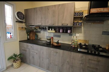 Kitchen in 2.5 BHK Apartment at Bhartiya Nikoo Homes Phase 2, Thanisandra Main Road – for Sale