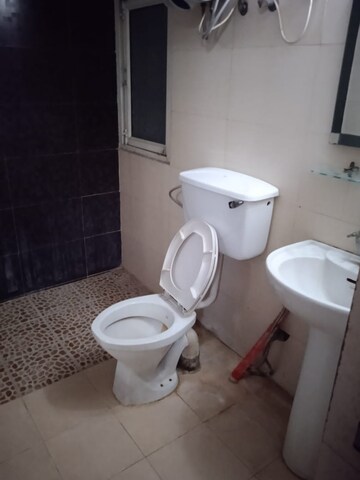 Bathroom in 3 BHK Apartment at Mahagun Mascot, Sain Vihar – for Sale