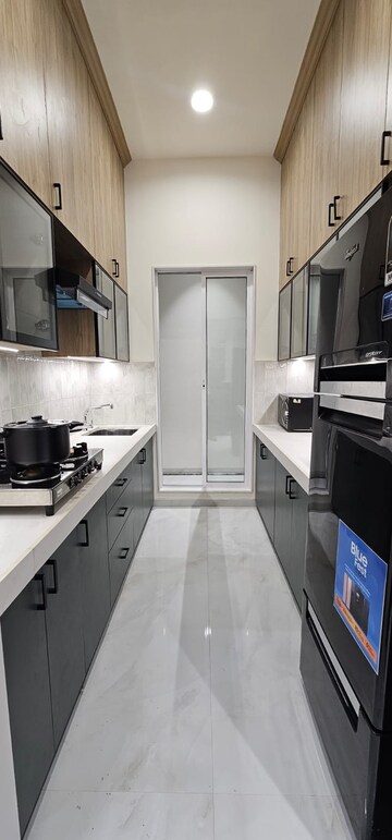 Kitchen in 1 BHK Apartment at Vihang Marina, Ghodbunder Road – for Sale