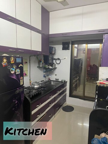 Kitchen in 2 BHK Apartment at Unique Poonam Estate Cluster 3, Mira Road – for Sale