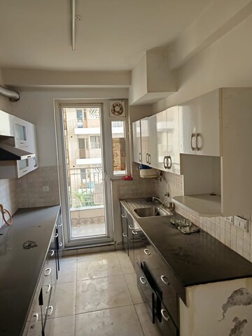 Kitchen in 3 BHK Apartment at BPTP Discovery Park, Sector 80 – for Sale