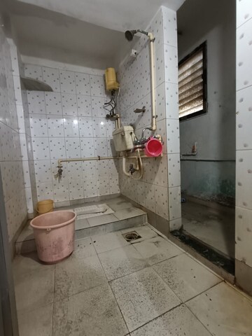 Bathroom in 2 BHK Apartment at Kharigaon – for Sale