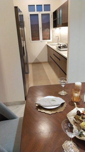 Kitchen in 2 BHK Apartment at Omkar Alta Monte, Malad East – for Sale