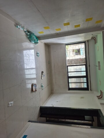 Living Room in 1.5 BHK Apartment at Dombivli East – for Sale