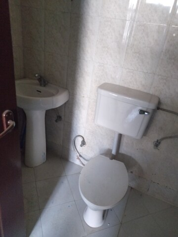 Bathroom in 2 BHK Apartment at Shree Energy Classic Residency, Raj Nagar Extension – for Rent