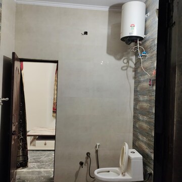 Bathroom in 3 BHK Builder Floor at ERA Green World, Sector 8 – for Sale
