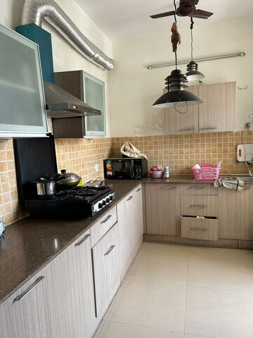 Kitchen in 4 BHK Builder Floor at Orchid Island, Sector 51 – for Sale