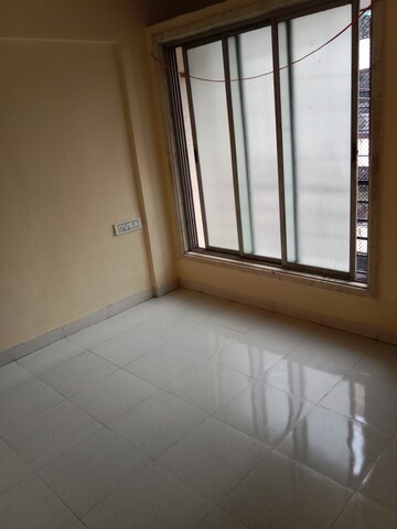 Bedroom in 1 BHK Apartment at Rashmi Star City, Naigaon East – for Sale