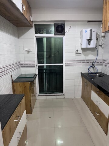Kitchen in 1 BHK Apartment at Gaurav Woods, Mira Road – for Sale